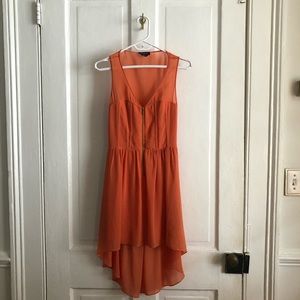 Bebe XS orange zipper Dress with a cut-out back